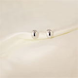 Puka Silver Studs