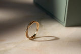 https://ik.imagekit.io/fzkghjurk1l/resize-external/https://storage.googleapis.com/shop_images/Akind/AKIND_CrossoverAllianceBlackDiamondRing_Enviro.jpg?tr=w-2000,h-2000,c-at_max,f-jpg,bg-white