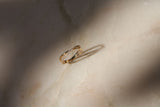 https://ik.imagekit.io/fzkghjurk1l/resize-external/https://storage.googleapis.com/shop_images/Akind/AKIND_CrossoverAllianceDiamondRing_Enviro.jpg?tr=w-2000,h-2000,c-at_max,f-jpg,bg-white