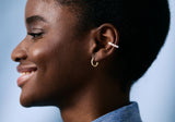 https://ik.imagekit.io/fzkghjurk1l/resize-external/https://storage.googleapis.com/shop_images/Akind/AKIND_ThreadedPearlEarCuff_1.jpg?tr=w-2000,h-2000,c-at_max,f-jpg,bg-white