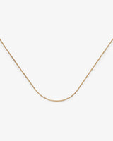 https://ik.imagekit.io/fzkghjurk1l/resize-external/https://storage.googleapis.com/shop_images/Akind/Petite%20Chain%20Necklace%20YG%20%283%29.jpg?tr=w-2000,h-2000,c-at_max,f-jpg,bg-white