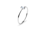 https://ik.imagekit.io/fzkghjurk1l/resize-external/https://storage.googleapis.com/shop_images/Akind/AKIND_VerticalBaguetteDiamondRing_WG_Studio.png?tr=w-2000,h-2000,c-at_max,f-jpg,bg-white