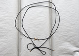 akind goldspiralcordnecklace enviro