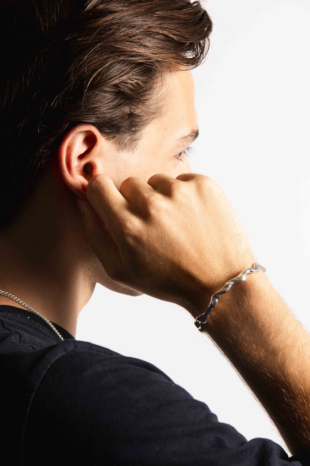 IX Axel Silberarmband