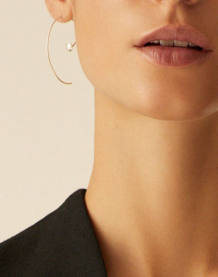Kinsmen Silver Earring