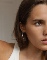 Kinsmen silberner Ohrring