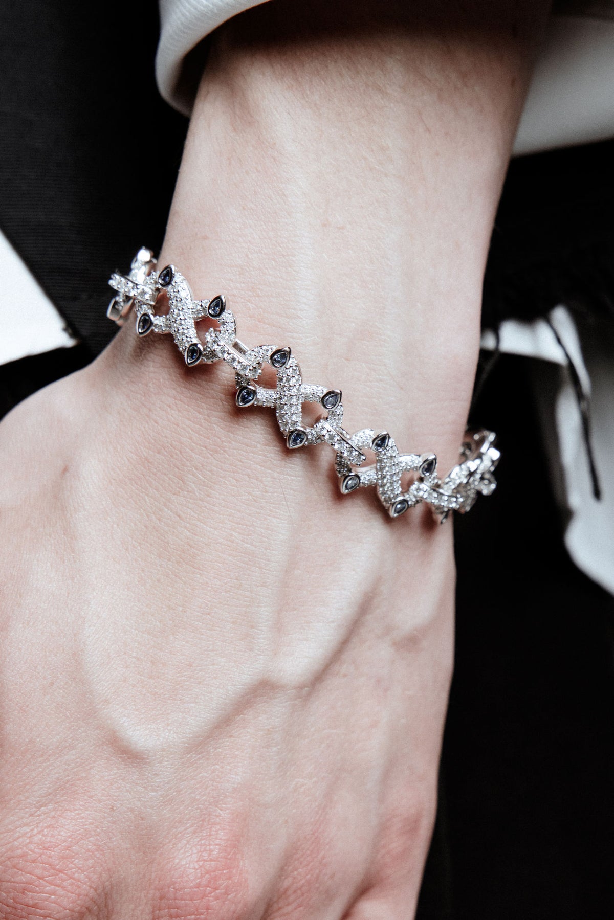 Infinity Rhodium Plated Silver Bracelet w. Moissanites