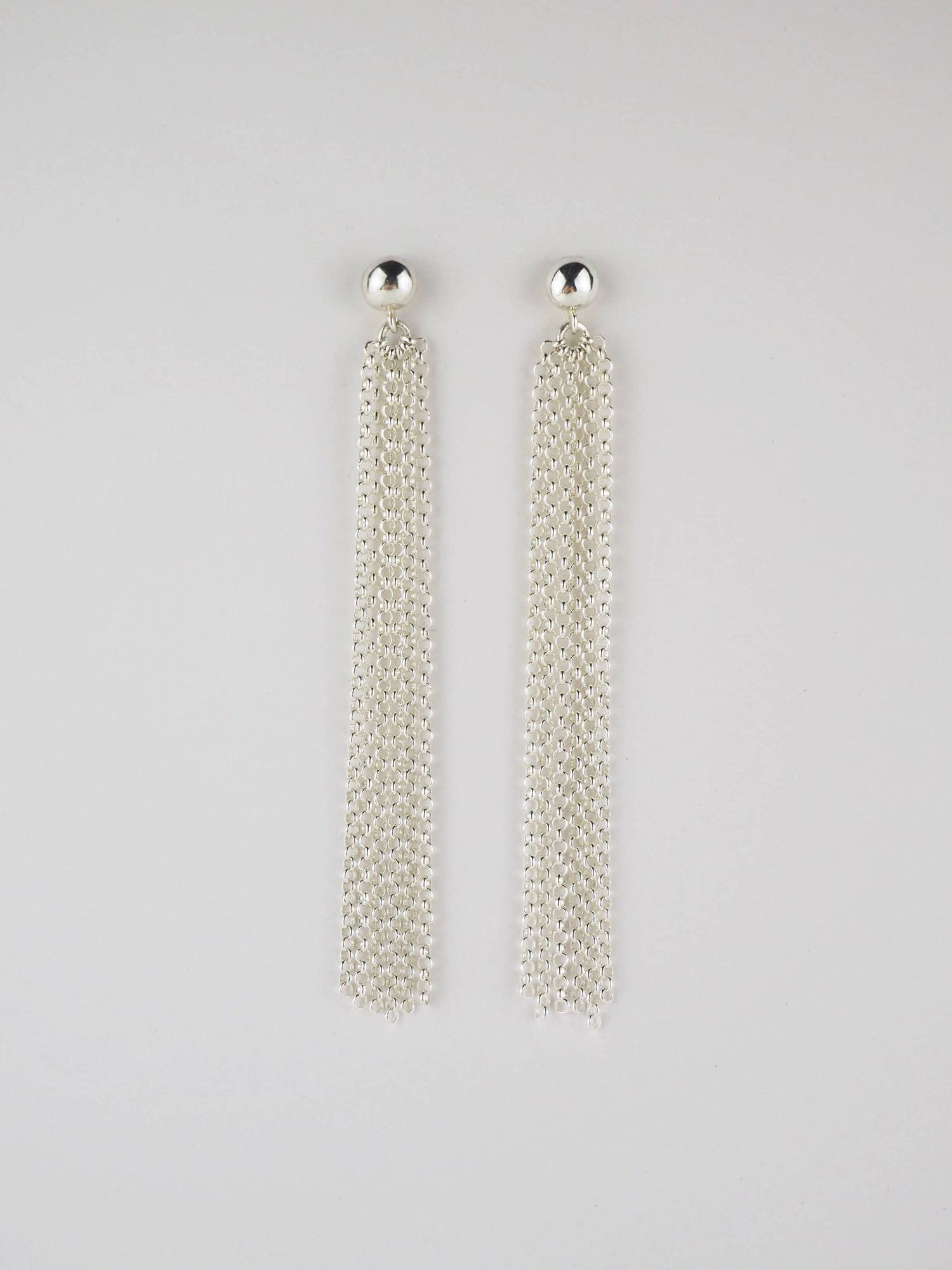 Long Pompons Silver Earrings