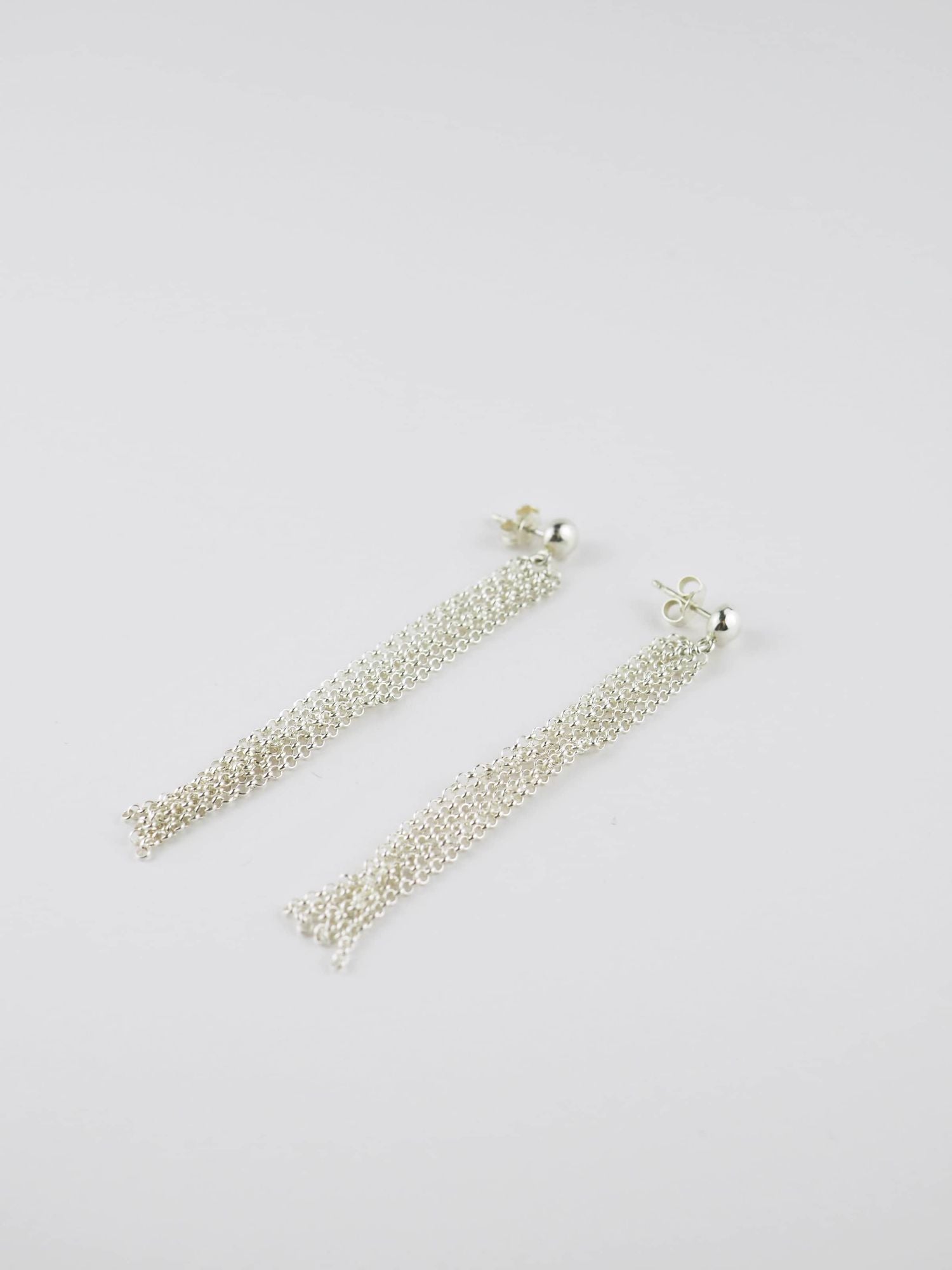 Long Pompons Silver Earrings