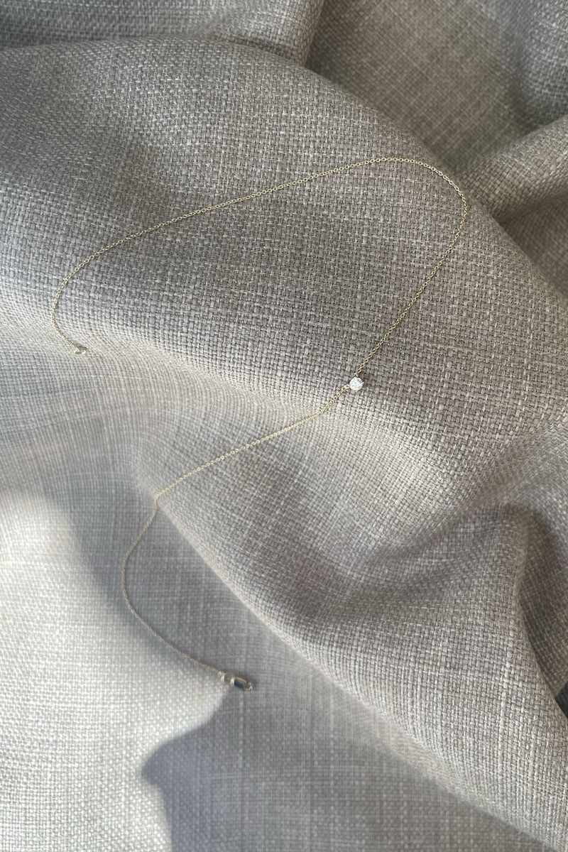 Es x ro schwimmende Diamant 18k Gold Halskette