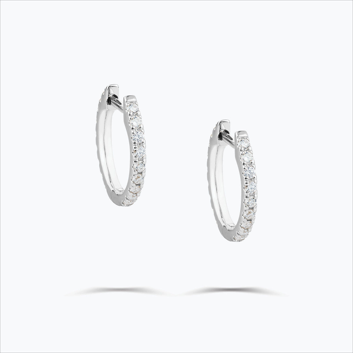 Single Line 18K White Gold Hoops w. Diamonds