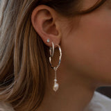 The Twist large Silver Hoop