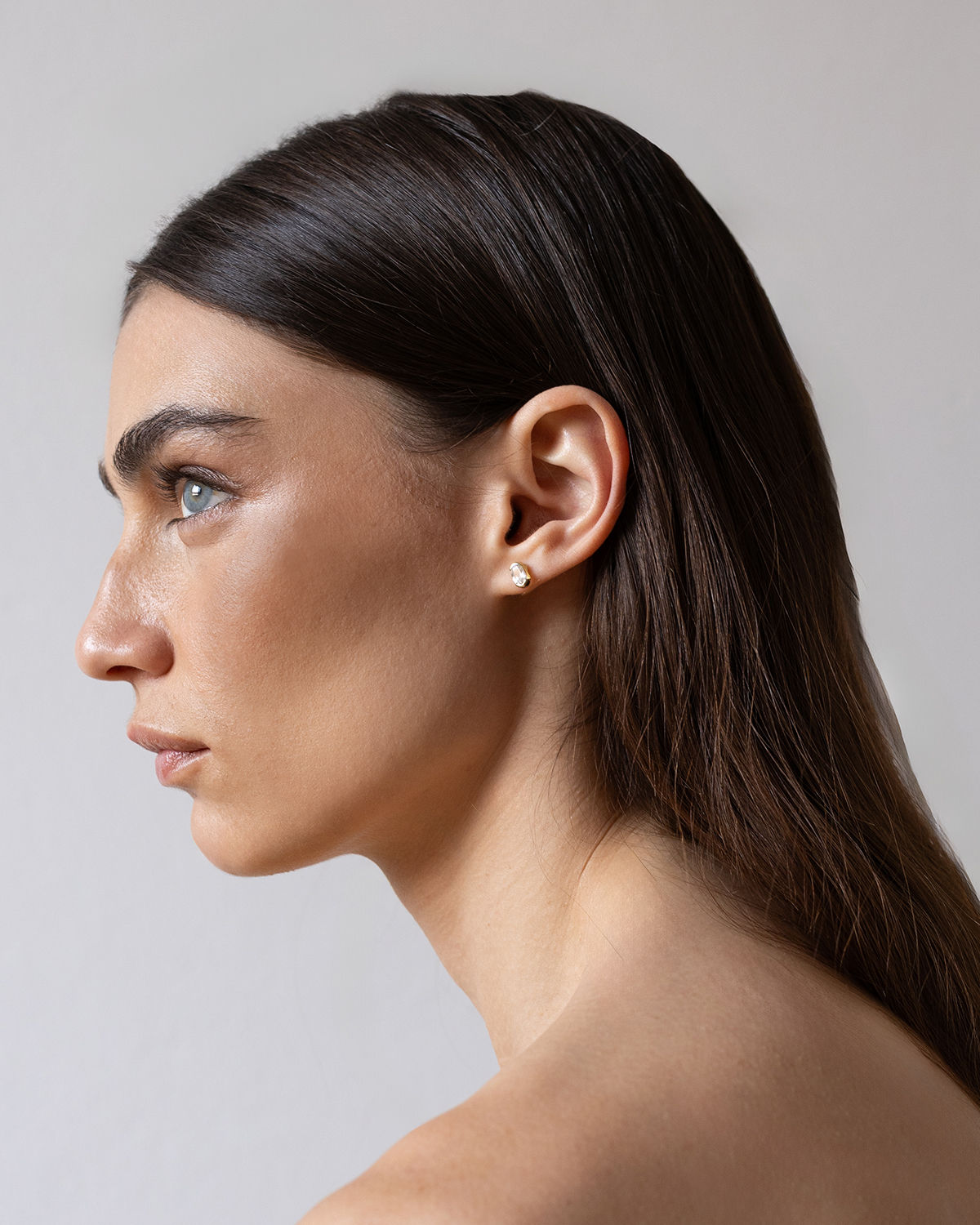 Senza fine 9K Gold Stud w. Sapphire