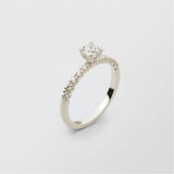 Soft Solitaire 18K Whitegold Ring w. 0.40 ct and 0.015ct Diamonds