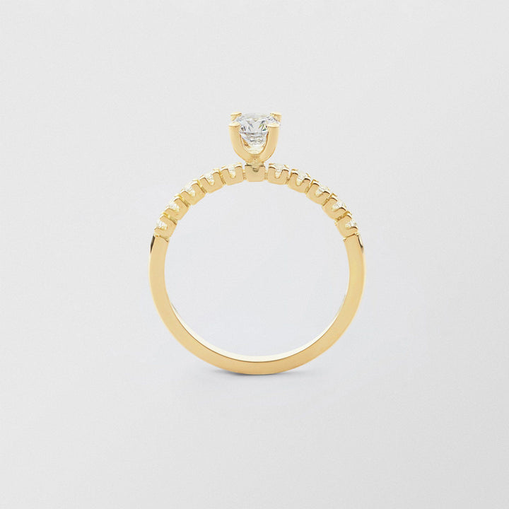Soft Solitaire 18K Gold Ring w. 0.50 ct and 0.015ct Diamonds