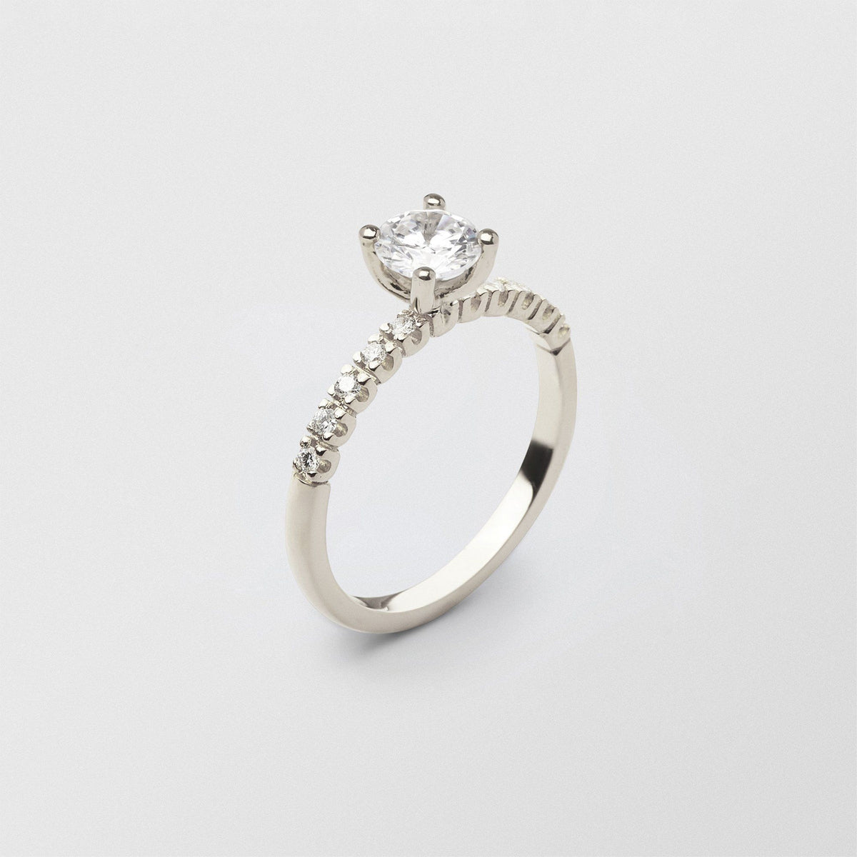 Soft Solitaire 18K Whitegold Ring w. 0.70 ct and 0.015ct Diamonds
