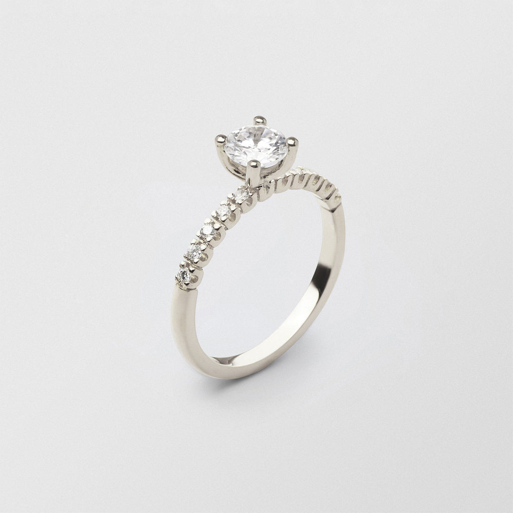 Soft Solitaire 18K Whitegold Ring w. 0.70 ct and 0.015ct Diamonds