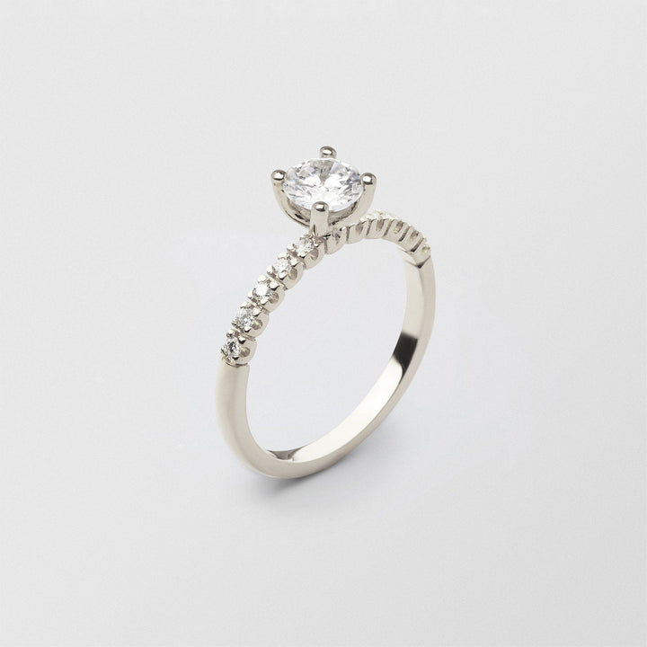 Soft Solitaire 18K Whitegold Ring w. 0.70 ct and 0.015ct Diamonds