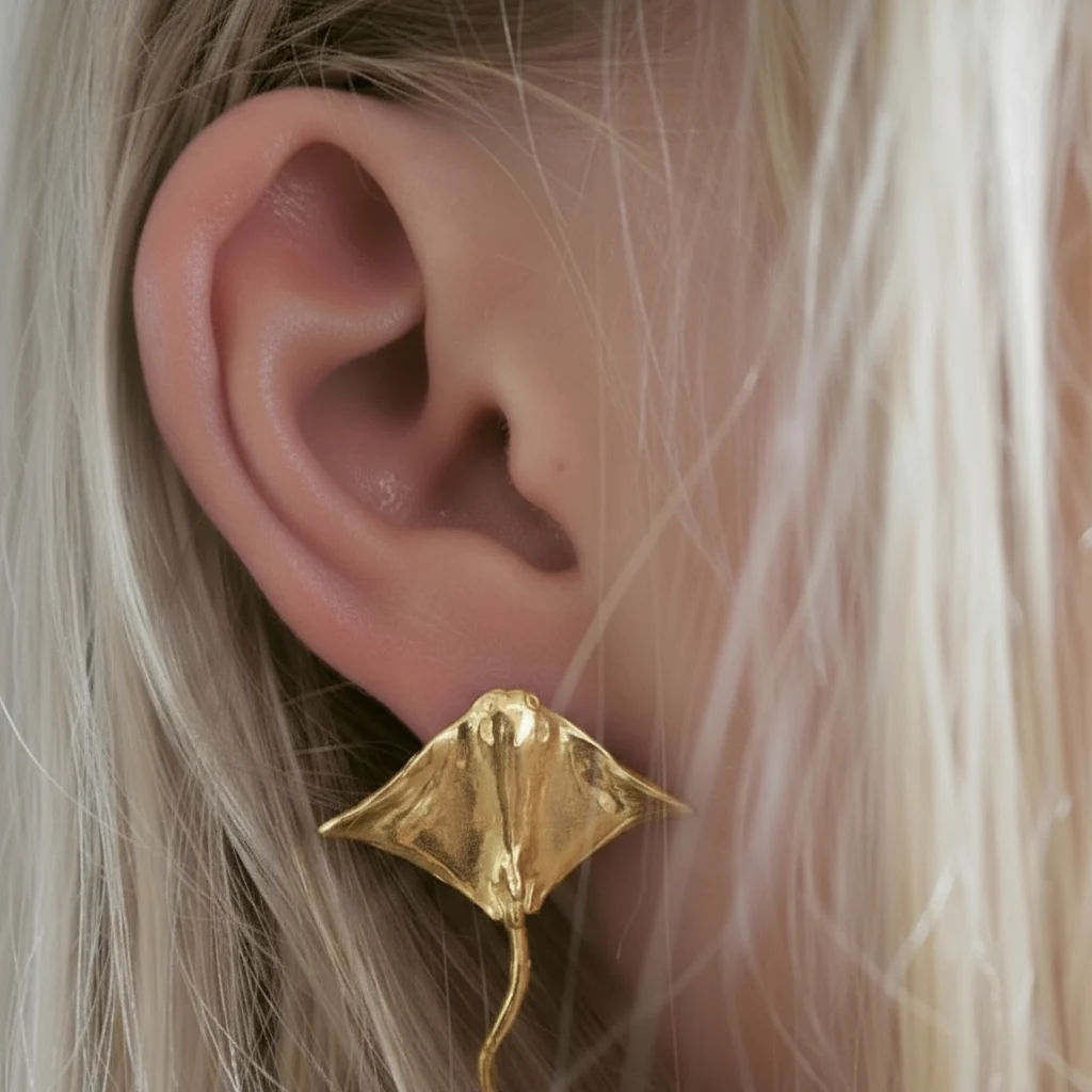 gold devilfish earrings