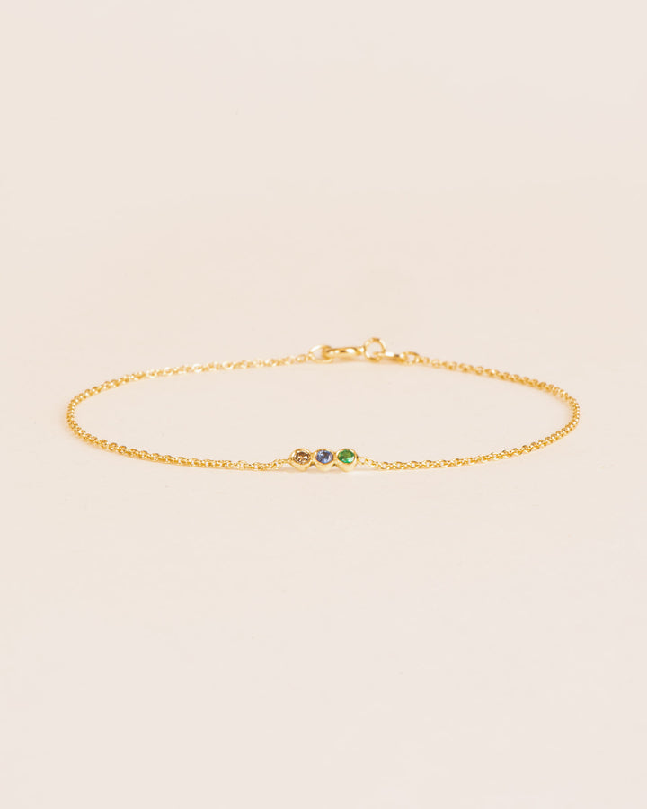 18K Gold Bracelet w. Diamond, Tsavorite & London blue topaz