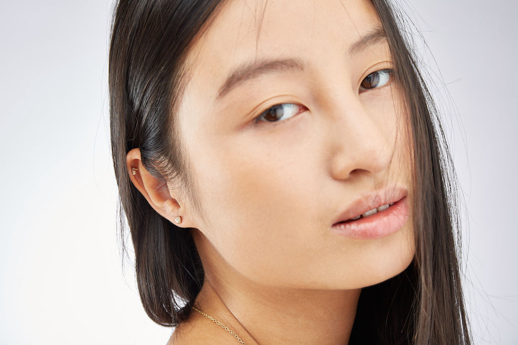 9K Gold Studs w. Ocean Diamonds