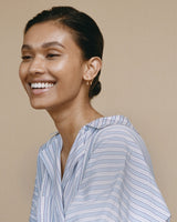 18K Gold Hoops w. dangling white Diamonds