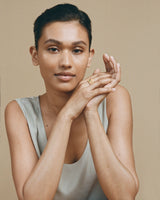 Twisted 18K Gold Ring w. Emerald