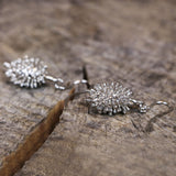 Serra hvidgyldte øreringe