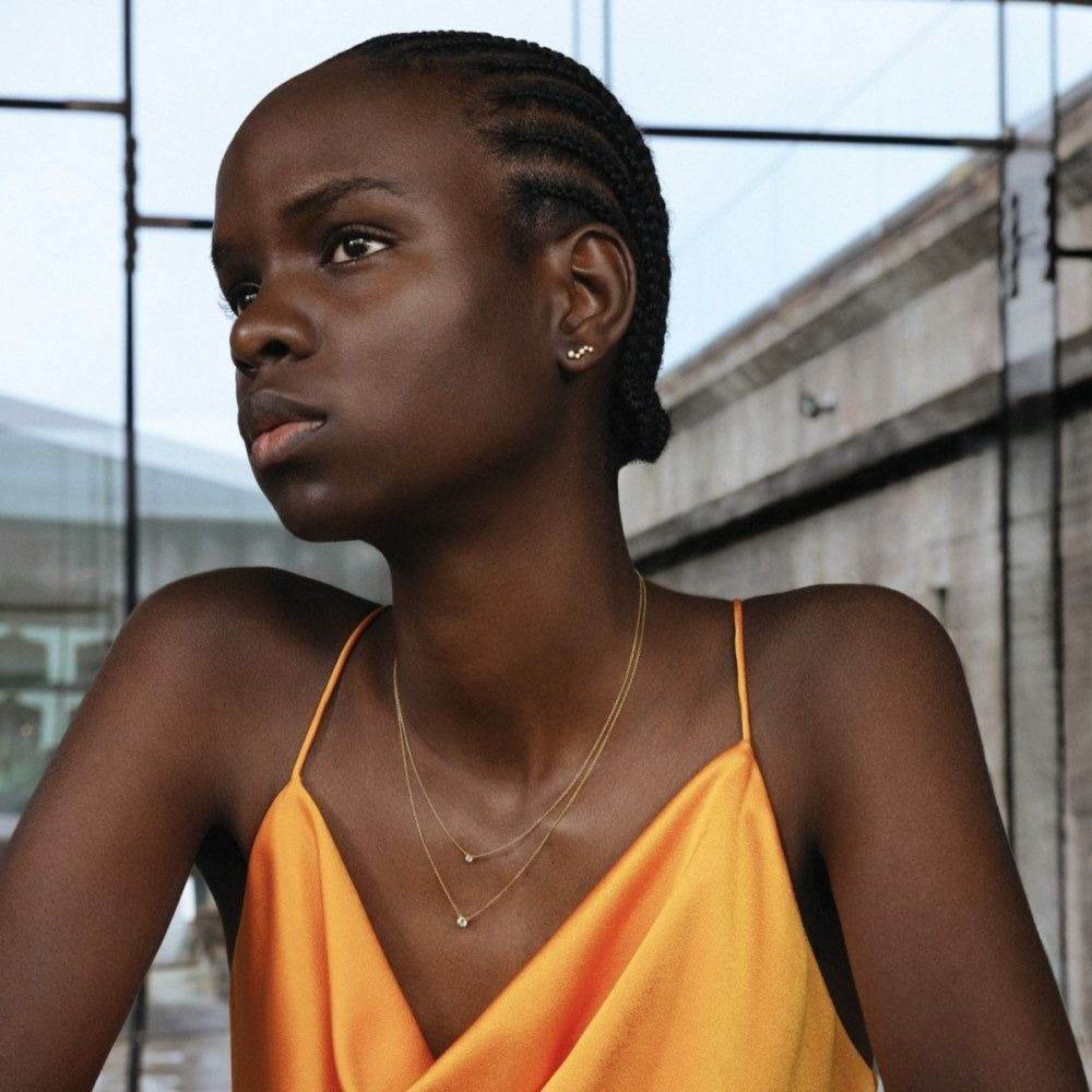 Signature 18K Gold Studs w. 0.18ct Diamonds