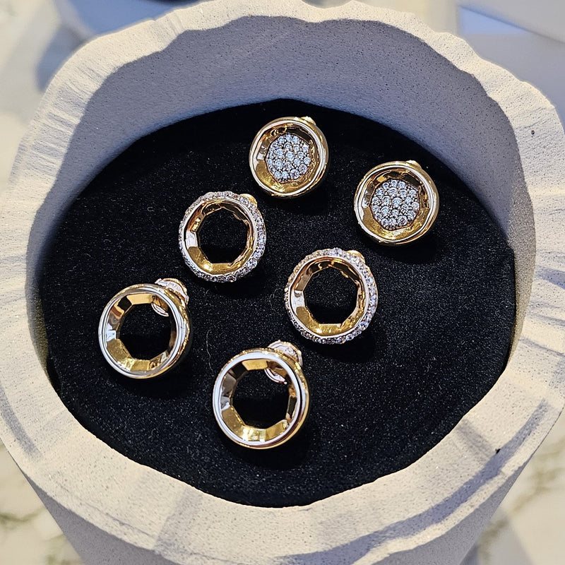 A. Sun Halo 18K Gold Studs w. Jet Black Enamel