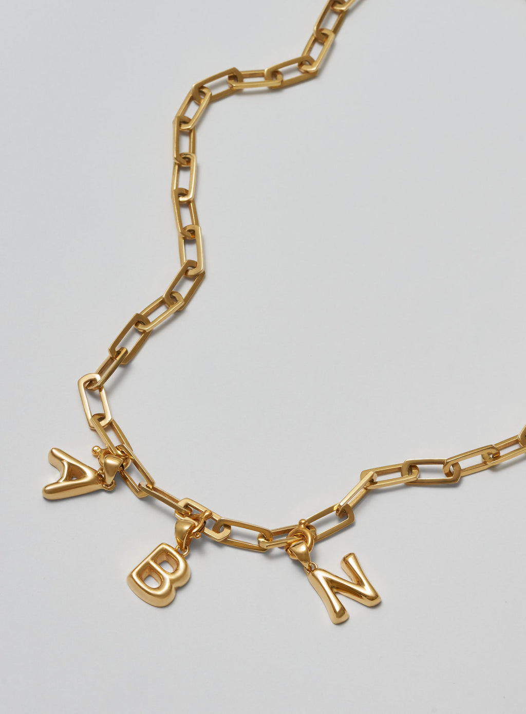 Helium Letter Gold Plated Pendant