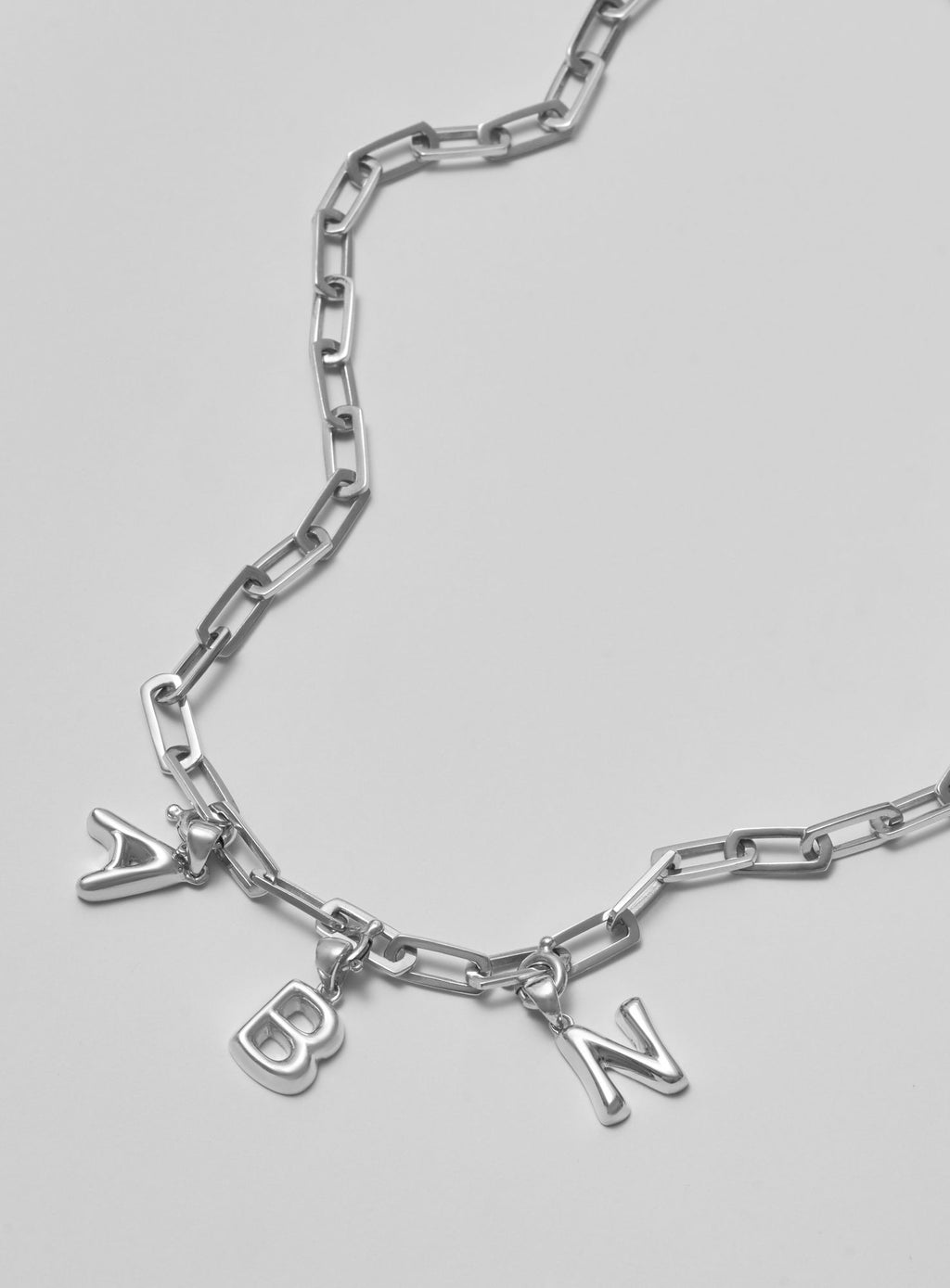 Helium Letter Silver Pendant