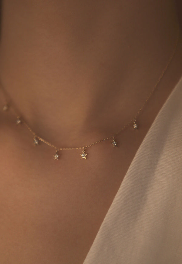 Tiny Star Halskette aus 18K Rosegold mit Diamant