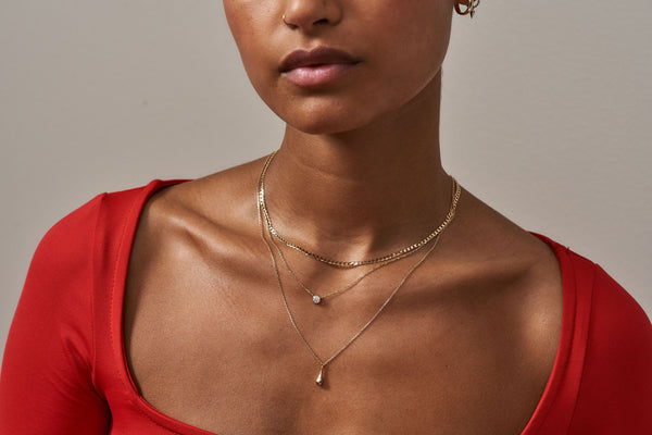 https://ik.imagekit.io/fzkghjurk1l/resize-external/https://storage.googleapis.com/shop_images/Akind/AKIND_DiamondNecklace_0.25ct_1.jpg?tr=w-2000,h-2000,c-at_max,f-jpg,bg-white