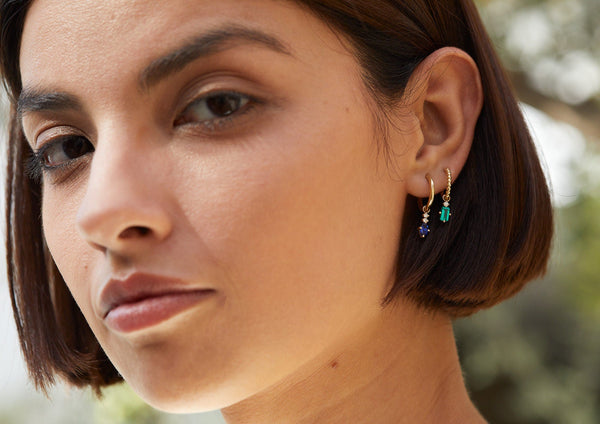 https://ik.imagekit.io/fzkghjurk1l/resize-external/https://storage.googleapis.com/shop_images/Akind/AKIND_EmearldHoopCharm_1.jpg?tr=w-2000,h-2000,c-at_max,f-jpg,bg-white