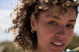 https://ik.imagekit.io/fzkghjurk1l/resize-external/https://storage.googleapis.com/shop_images/Akind/AKIND_ThreadedPearlHoops_1.jpg?tr=w-2000,h-2000,c-at_max,f-jpg,bg-white