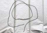 https://ik.imagekit.io/fzkghjurk1l/resize-external/https://storage.googleapis.com/shop_images/Akind/AKIND_GoldKnotCordNecklace_Enviro.jpg?tr=w-2000,h-2000,c-at_max,f-jpg,bg-white