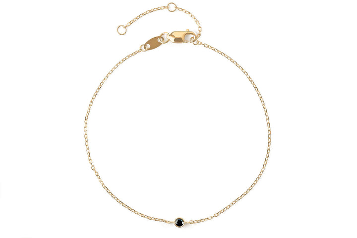 https://ik.imagekit.io/fzkghjurk1l/resize-external/https://storage.googleapis.com/shop_images/Akind/AKIND_BlackDiamondBracelet_YG_Studio.png?tr=w-2000,h-2000,c-at_max,f-jpg,bg-white