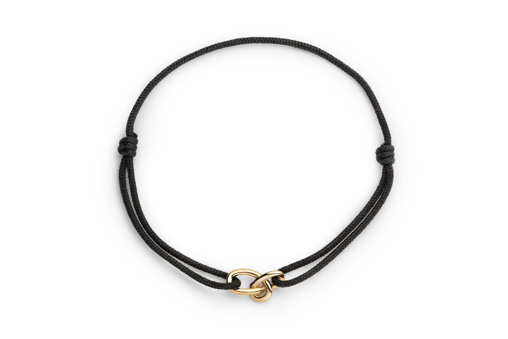 https://ik.imagekit.io/fzkghjurk1l/resize-external/https://storage.googleapis.com/shop_images/Akind/AKIND_GoldKnotCordBracelet_Studio1.png?tr=w-2000,h-2000,c-at_max,f-jpg,bg-white