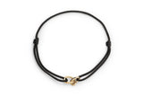 https://ik.imagekit.io/fzkghjurk1l/resize-external/https://storage.googleapis.com/shop_images/Akind/AKIND_GoldKnotCordBracelet_Studio1.png?tr=w-2000,h-2000,c-at_max,f-jpg,bg-white