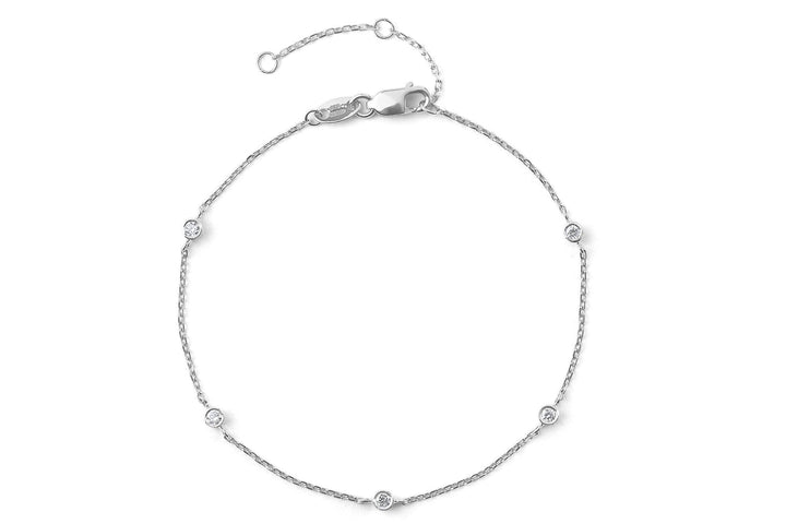 https://ik.imagekit.io/fzkghjurk1l/resize-external/https://storage.googleapis.com/shop_images/Akind/AKIND_StationDiamondBracelet_WG_Studio.png?tr=w-2000,h-2000,c-at_max,f-jpg,bg-white