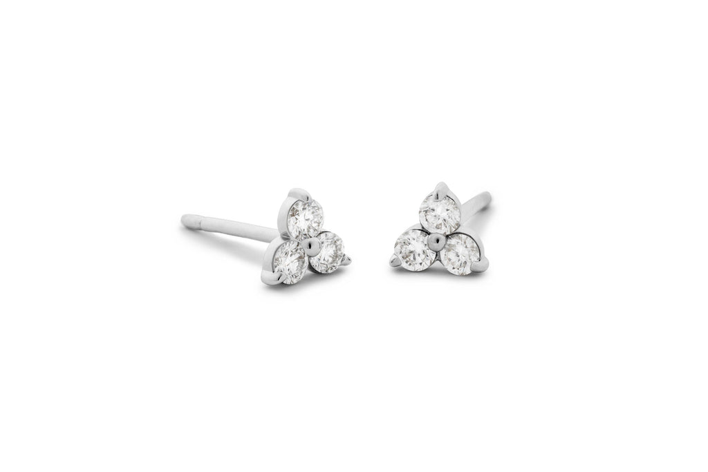 https://ik.imagekit.io/fzkghjurk1l/resize-external/https://storage.googleapis.com/shop_images/Akind/AKIND_DiamondTrinityStuds_WG_Studio.png?tr=w-2000,h-2000,c-at_max,f-jpg,bg-white
