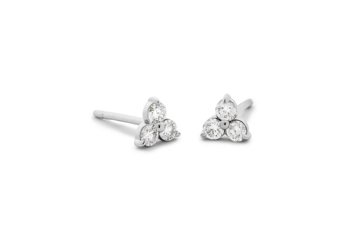 https://ik.imagekit.io/fzkghjurk1l/resize-external/https://storage.googleapis.com/shop_images/Akind/AKIND_DiamondTrinityStuds_WG_Studio.png?tr=w-2000,h-2000,c-at_max,f-jpg,bg-white