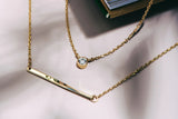 https://ik.imagekit.io/fzkghjurk1l/resize-external/https://storage.googleapis.com/shop_images/Akind/AKIND_TwistNecklace_Enviro.png?tr=w-2000,h-2000,c-at_max,f-jpg,bg-white