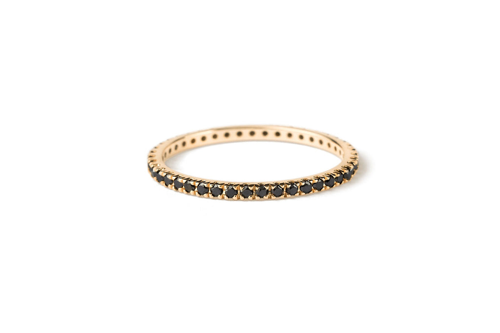 https://ik.imagekit.io/fzkghjurk1l/resize-external/https://storage.googleapis.com/shop_images/Akind/AKIND_AllianceBlackDiamondRIng_Laying_YG_Studio.png?tr=w-2000,h-2000,c-at_max,f-jpg,bg-white