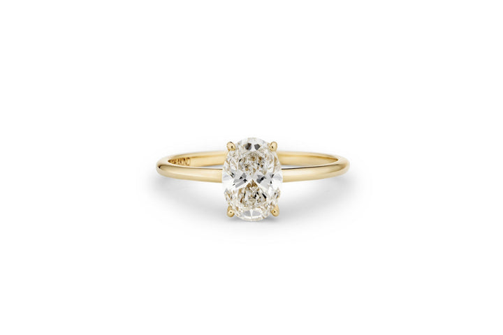 https://ik.imagekit.io/fzkghjurk1l/resize-external/https://storage.googleapis.com/shop_images/Akind/AKIND_OvalCutDiamondRing1.0ct_Laying_YG_Studio.png?tr=w-2000,h-2000,c-at_max,f-jpg,bg-white