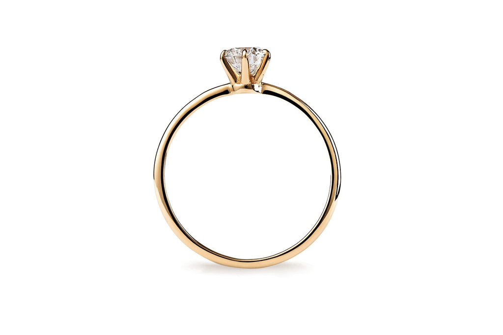 https://ik.imagekit.io/fzkghjurk1l/resize-external/https://storage.googleapis.com/shop_images/Akind/AKIND_SixProngDiamondRing0.5ct_Side_YG_Studio.png?tr=w-2000,h-2000,c-at_max,f-jpg,bg-white