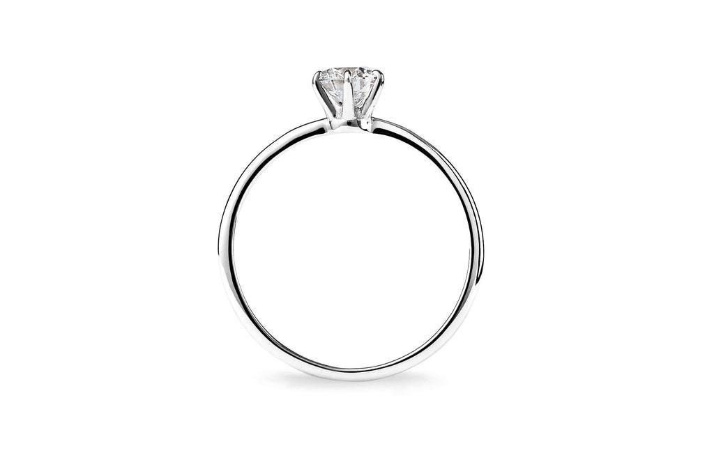 https://ik.imagekit.io/fzkghjurk1l/resize-external/https://storage.googleapis.com/shop_images/Akind/AKIND_SixProngDiamondRing0.5ct_Side_WG_Studio.png?tr=w-2000,h-2000,c-at_max,f-jpg,bg-white