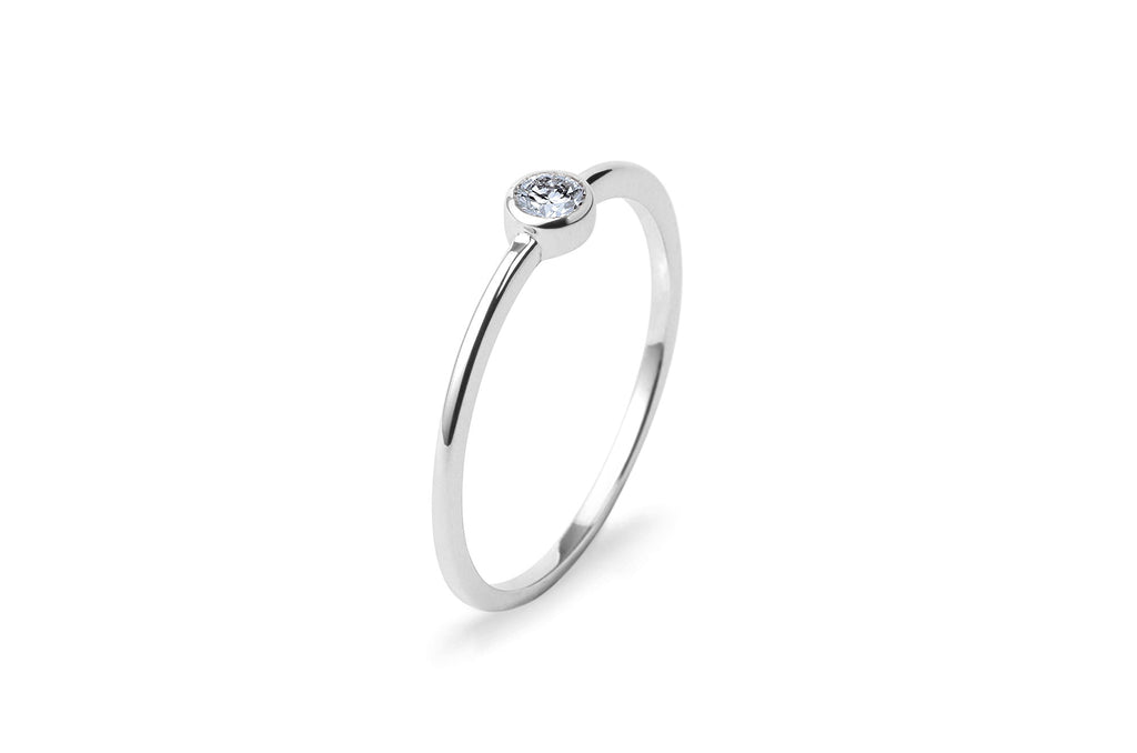 https://ik.imagekit.io/fzkghjurk1l/resize-external/https://storage.googleapis.com/shop_images/Akind/AKIND_DiamondRing_WG_Studio.png?tr=w-2000,h-2000,c-at_max,f-jpg,bg-white