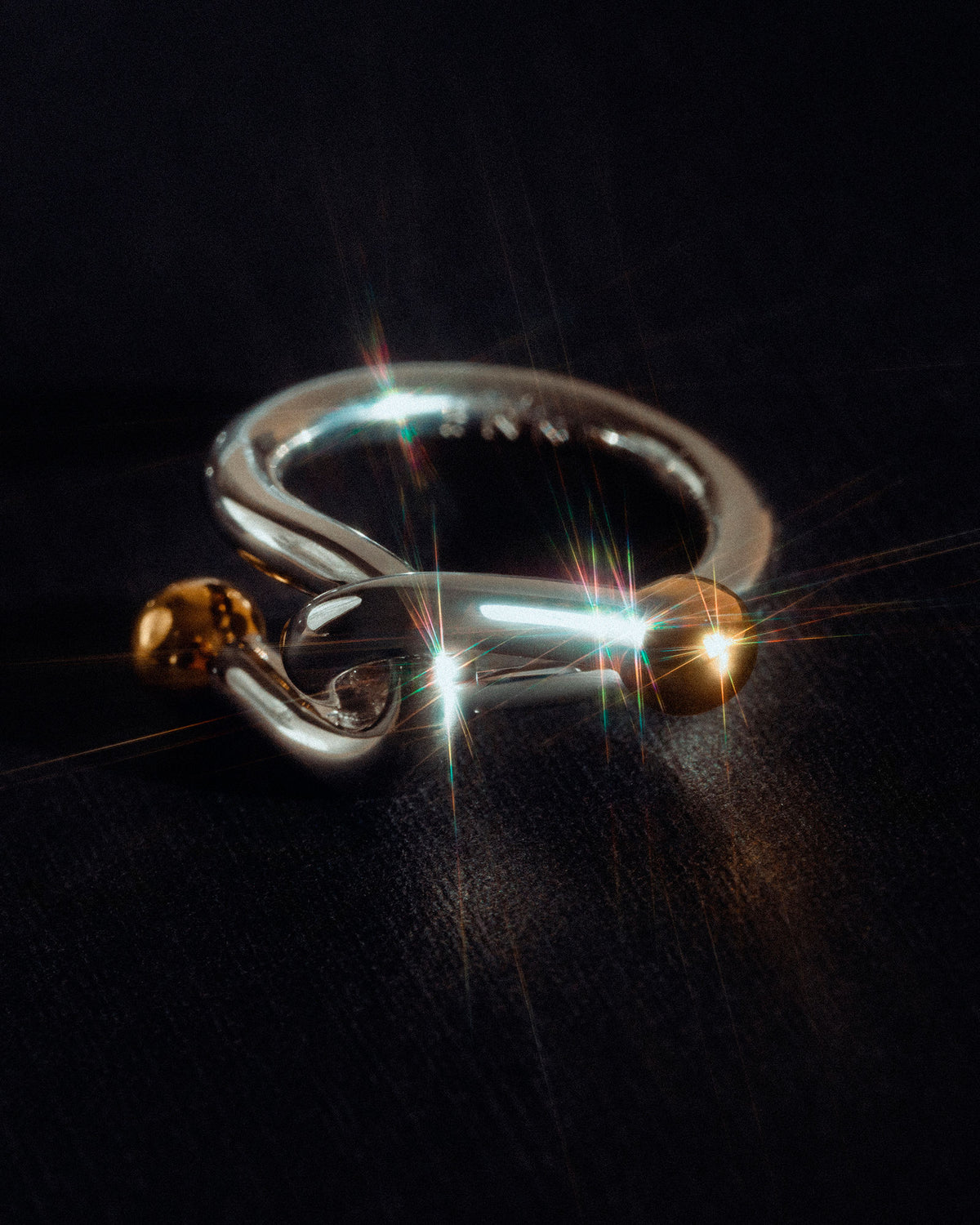 Falcate Rhodium plated Silver Ring